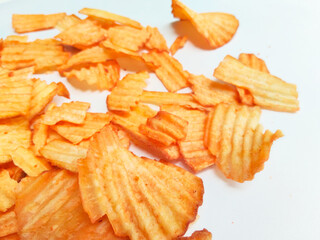 Wavy and Seasoned Snack Food, Highlighting the Delicious Salty Surface