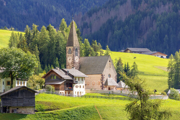 Val di Funes, Italy summer scenic view of Santa Magdalena church, idyllic Dolomites landscape in...