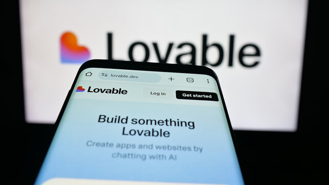 Stuttgart, Germany - 09-25-2025: Mobile phone with website of Swedish ai software company Lovable Labs Inc. on screen in front of logo. Focus on top-left of phone display.