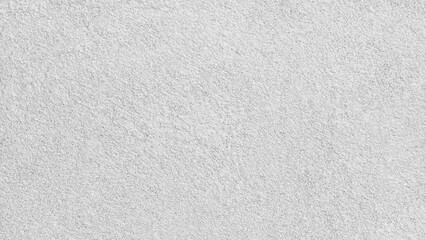 Obraz premium White gray wall with cracks and holes. wall is covered with white paint and has rough texture background for web banner template page.