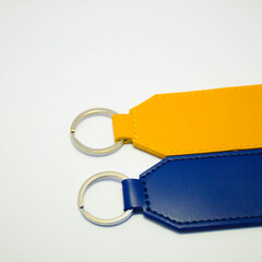 Luggage tags for suitcases photographed on a white background. Concept of travel accessories, personalized tags, custom design, and modern travel essentials