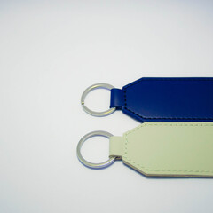 Luggage tags for suitcases photographed on a white background. Concept of travel accessories, personalized tags, custom design, and modern travel essentials