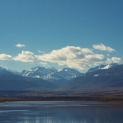 Mountain lake and blue sky. Background Image. Minimalist backdrop. Template design 