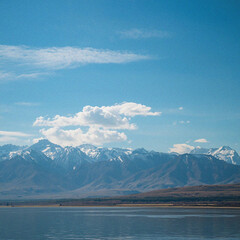 Mountain lake and blue sky. Background Image. Minimalist backdrop. Template design 