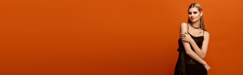 Charming young woman in festive Halloween costume enjoying the spooky season