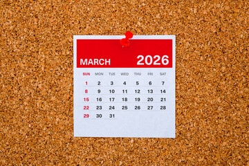 March 2026 Calendar Page on Cork Board with Red Pin