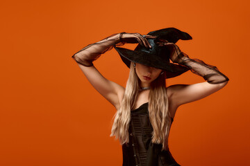 Enchanting young woman in Halloween costume brings spooky vibes for the festive season