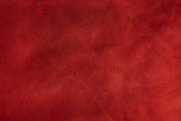 Red suede as a background macro photo.