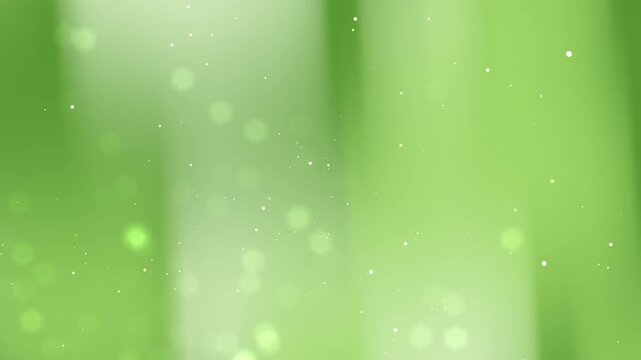 Blurry green background with bokeh light patterns, great for spring or naturethemed designs, website headers, or social media graphics.