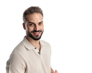 Obraz premium handsome young man in polo shirt looking forward and smiling