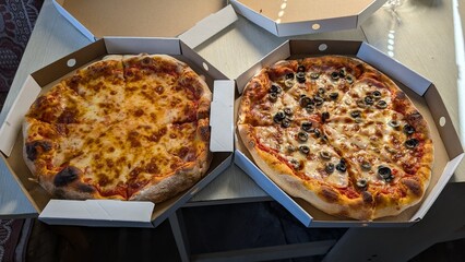 A Delicious Variety of Pizza Is Spread Out on a Table, Ready to Be Enjoyed by All