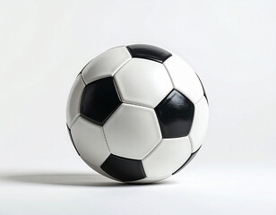 Naklejka premium A single, traditional black and white soccer ball centered on a white background. Ready for the beautiful game.