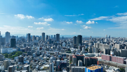 Fototapeta premium city, society, aerial view, drone, perspective, blue sky, real estate, construction, landscape, japan, traffic, road, urban area, cluster of buildings, horizon, building, economy, business, bird eye v