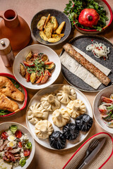 Traditional Georgian feast with khinkali and kebab