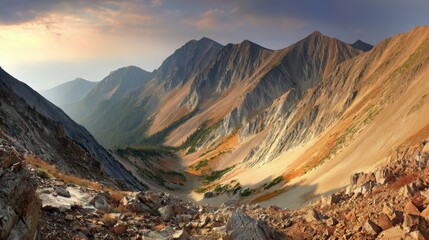 alpine. Panoramic alpine landscape at dusk with warm golden light on mountain peaks. travel magazines, destination branding, designed for outdoor magazines and nature guides.