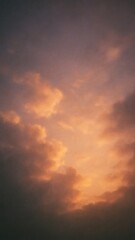Naklejka premium Dramatic sunset sky with vibrant orange clouds mobile wallpaper