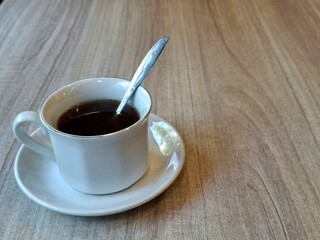 A cup of warm tea on the table