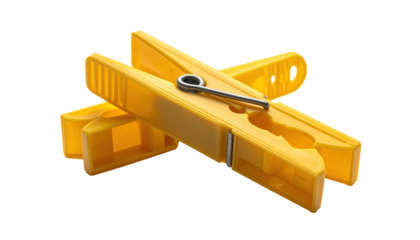 Two yellow plastic fasteners with steel pin, arranged crosswise against black background