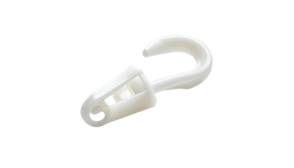 A white plastic curtain hook against a stark black background, offering a close-up perspective