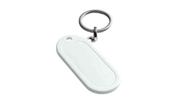 An oblong white key chain tag with a round metal ring on a dark background