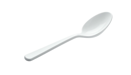 Isolated white plastic spoon against a black background. Clean and simple, angled