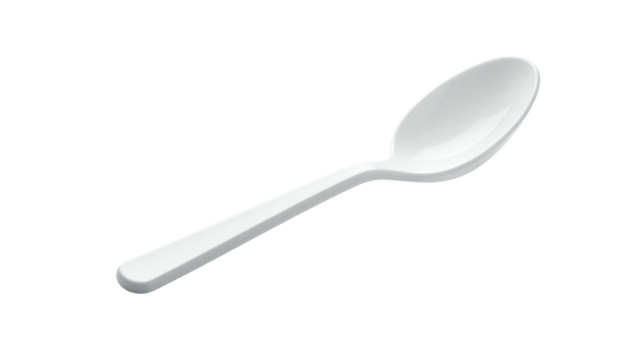 Isolated white plastic spoon against a black background. Clean and simple, angled
