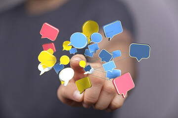 Digital hand reaching for connected speech bubbles, concept of communication, network, social...