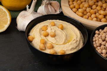 Hummus in bowl, houmous dip, chickpea humus tahini sauce, middle eastern spread