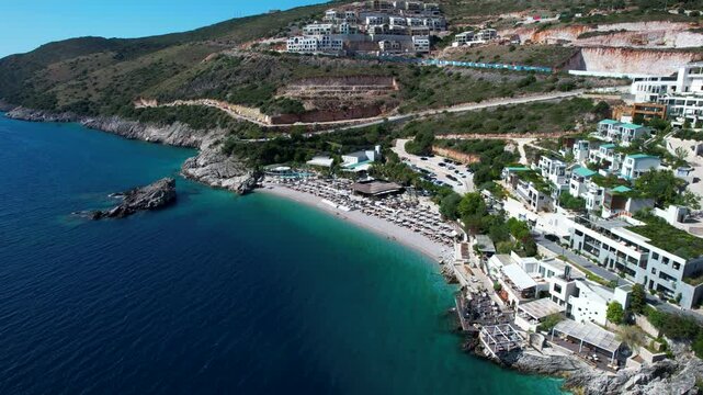 Secluded Summer Retreat on Ionian Coast, Tourists Sunbathing on a Hidden Peaceful Beach in Jale, Albania