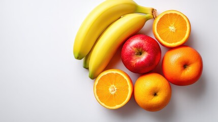 Fresh, Colorful Assortment of Fruits Displayed on a Light Background, Featuring Bananas, Apples, and Various Citrus Fruits for Healthy Lifestyle Inspiration