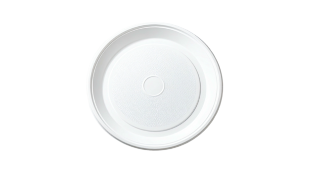 Overhead shot of a clean, round, white, disposable plate against a black background