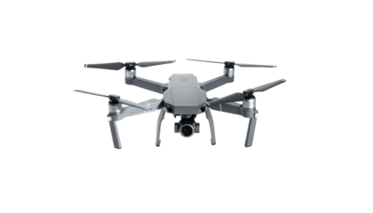 A grey aerial drone, with propellers and camera, is isolated on a black background