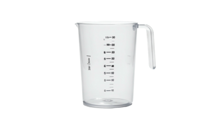 Clear plastic container with handle, used for measuring liquids, on black background