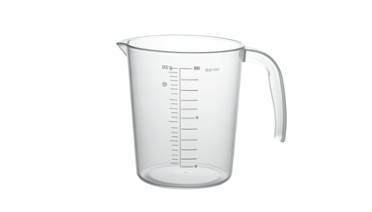 Clear plastic graduated measuring pitcher with handle, against a black background