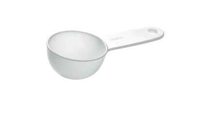White plastic scoop, handle with hole, tilted at angle against solid black background