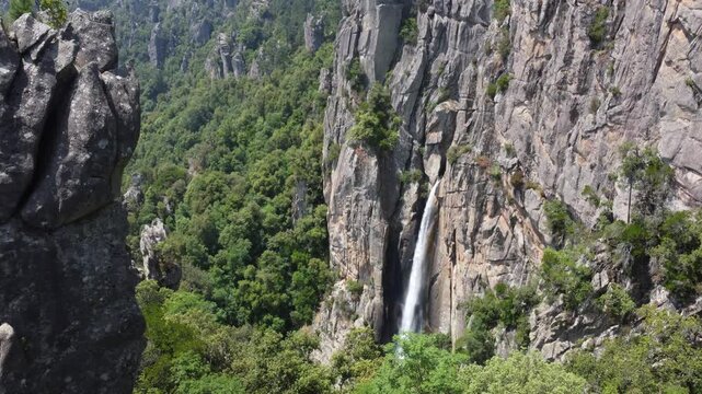 Piscia di Ghjaddu waterfall, Corsica, moving forward drone shot