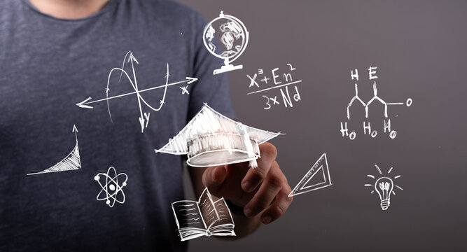 Man interacting with an innovative holographic display of educational and scientific symbols, representing the future of learning, knowledge, an