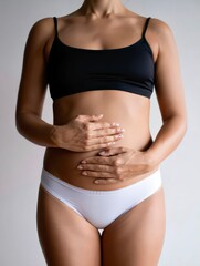 Pregnant woman early stage holding belly health