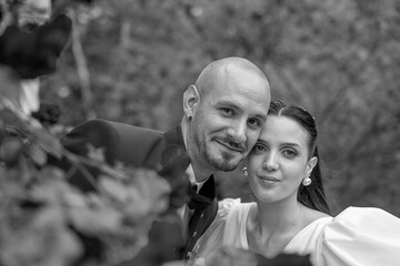 Relaxed bride and groom enjoying their wedding party after the ceremony with smiles and joy