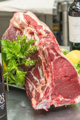 Fresh meat selection showcasing different cuts in a professional kitchen setting