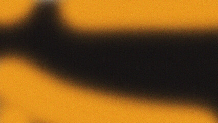 Abstract textured background with bold black stripe on vibrant yellow surface