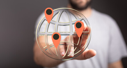 Stock photo of a person interacting with a digital globe, highlighting multiple locations. Perfect for business, technology, and global co