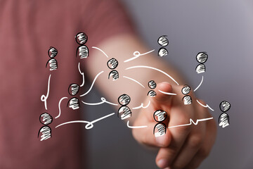 Abstract concept of human hand interacting with a digital network, symbolizing connection, communication, social media, and business collaborati