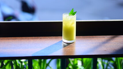 Passion fruit juice placed on the table in the morning sunlight