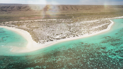 Aerial view of Turquoise Bay beach in Exmouth, Western Australia with clear blue waters