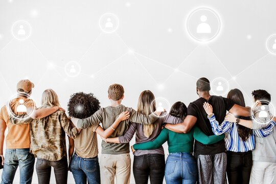 Rearview of diverse people hugging each other