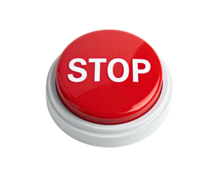 A glossy red button, with "STOP" in white, set on a white base. Black background