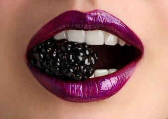 Woman with beautiful lips makeup and blackberry, closeup