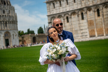 Romantic wedding couple sharing a special celebration in the urban heart of the city after marriage