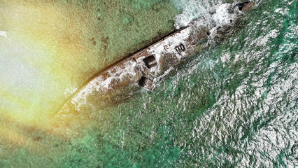 Aerial view of Mildura Wreck shipwreck on the coast of Exmouth, Western Australia from above